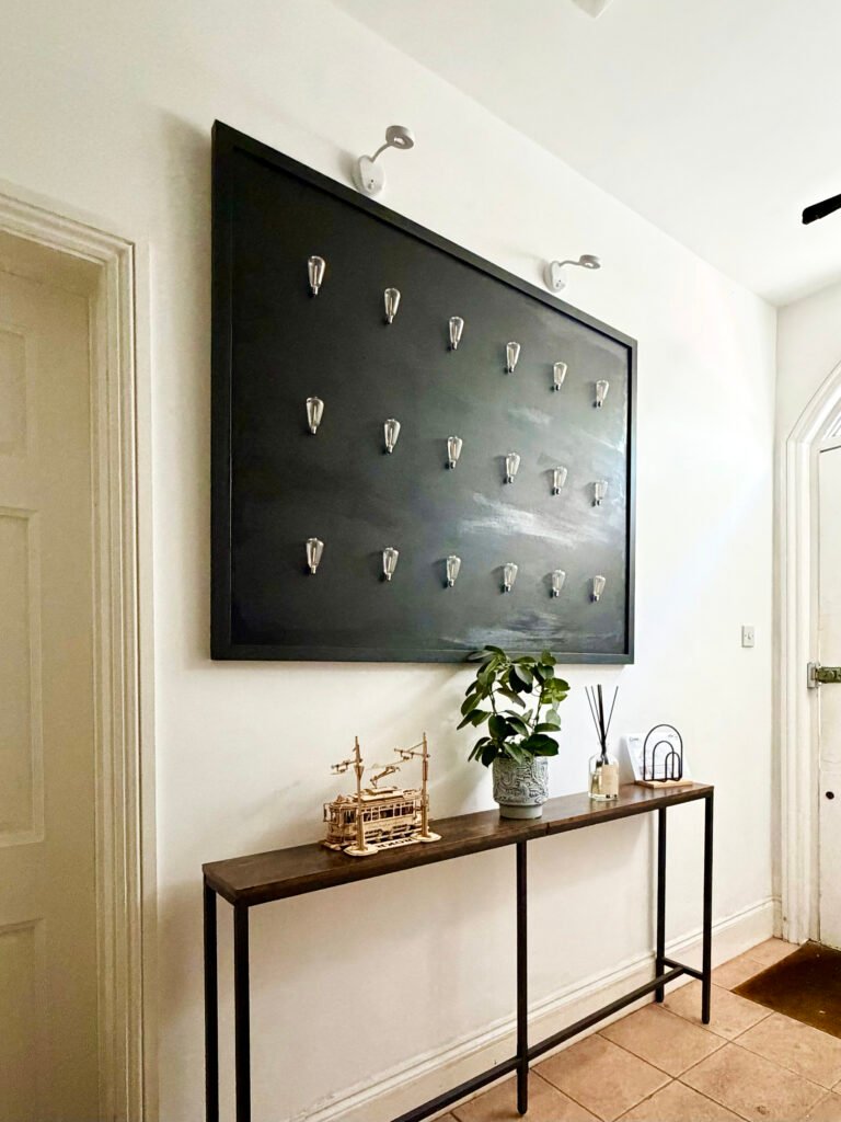 This is not a light installation by Alexandru Regent (Acrylic and lightbulbs on board, 2026)